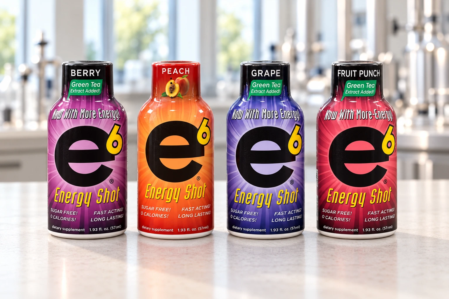 Four e6 Energy Shot bottles in Berry, Peach, Grape and Fruit Punch packaging